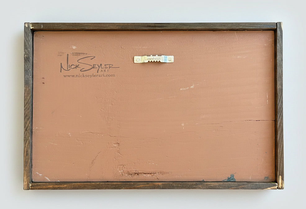 Back of a painting with 'Nick Seyler Art' signature and website URL.