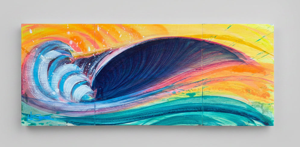 A colorful abstract wave painting on a rectangular canvas, featuring a large curling wave in deep blue, teal, and white against a bright yellow, orange, and pink sky, displayed on a concrete floor.