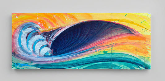 A colorful abstract wave painting on a rectangular canvas, featuring a large curling wave in deep blue, teal, and white against a bright yellow, orange, and pink sky, displayed on a concrete floor.