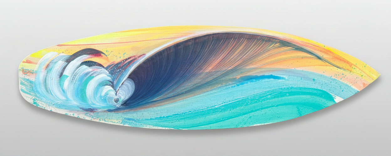 A painted surfboard-shaped wall art piece featuring a stylized ocean wave in blue, teal, white, yellow, and orange tones, photographed against a textured concrete background.