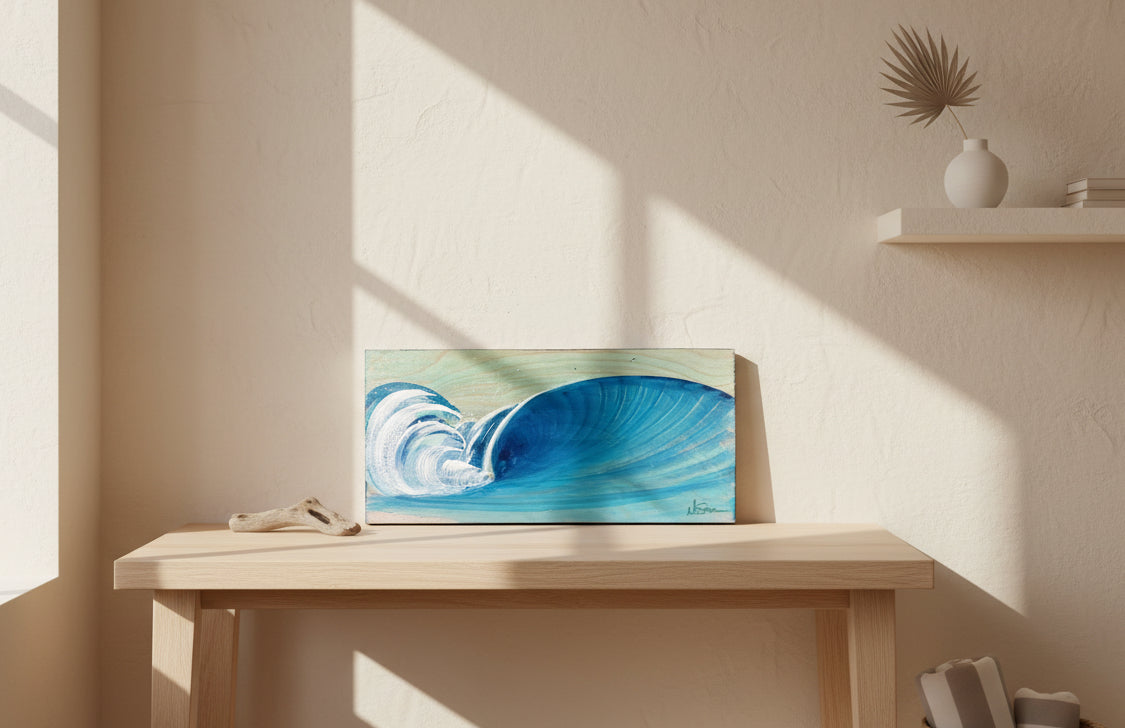 Wooden wave sculpture with blue paint on a colorful abstract background