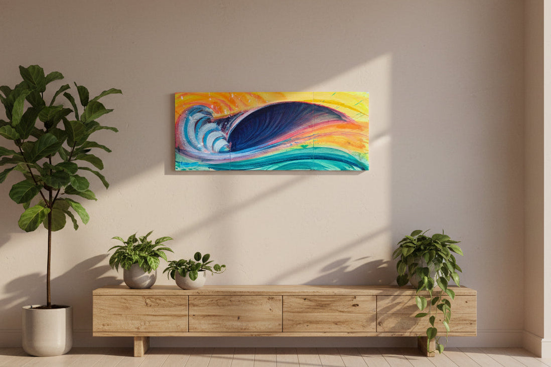 A colorful wave painting on a canvas is displayed on a beige wall above a light wood console table with potted plants in a modern, sunlit room.